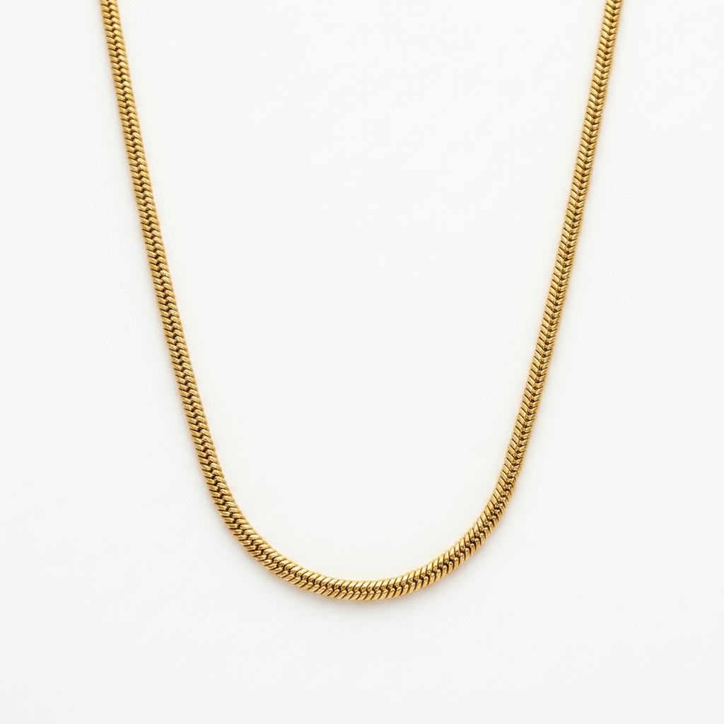 A close-up of a gold-toned chain necklace, shown draped in a U-shape against a plain white background.