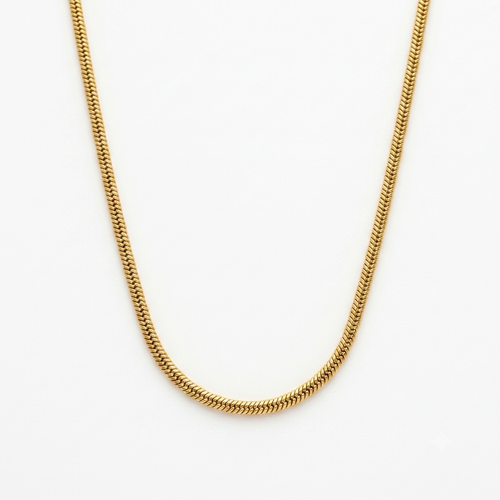 A close-up of a gold-toned chain necklace, shown draped in a U-shape against a plain white background.